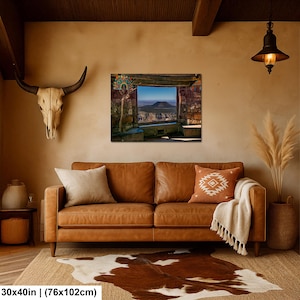 May include: A rectangular wall art print featuring a desert landscape view through a stone window frame, displayed above a brown leather sofa. The artwork measures 30 inches by 40 inches and depicts a mesa under a clear blue sky.
