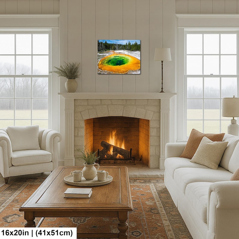 May include: A rectangular wall art print featuring a vibrant landscape of a geothermal hot spring with a deep green center surrounded by bright orange and yellow mineral rings, set against a backdrop of dark green pine trees and a blue sky.
