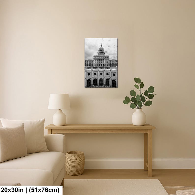 May include: A black and white wall art print featuring the Texas State Capitol building with its prominent dome and neoclassical architecture, displayed in a vertical orientation. The artwork measures 20 inches by 30 inches as indicated by text.