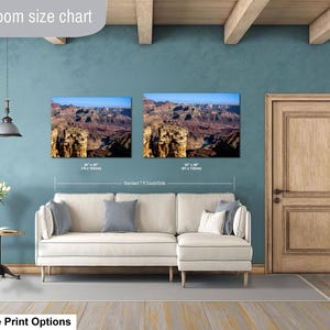 May include: A living room size chart displaying two rectangular landscape wall art prints of the Grand Canyon above a white sectional couch. The prints are labeled with dimensions of 30 x 40 inches and 32 x 48 inches, with a 7 foot couch reference.