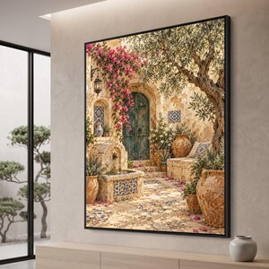 May include: A framed wall art print depicting a Mediterranean courtyard with a stone fountain, a weathered teal wooden door, vibrant pink bougainvillea flowers, an olive tree, and large terracotta pots on a patterned tiled floor.