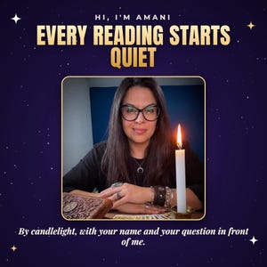 May include: A person with long dark hair and glasses wearing a black shirt and silver crescent moon necklace. A lit white candle in a brass holder, a carved wooden box, and a deck of cards are on the table. Text reads: HI, I'M AMANI EVERY READING STARTS QUIET By candlelight, with your name and your question in front of me.