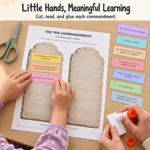May include: A printable activity sheet titled The Ten Commandments featuring two stone tablet illustrations with blank spaces for gluing coloured text cards. Includes scissors, a glue stick, and several pre-cut cards with religious text.