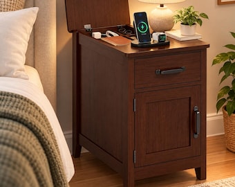 May include: A dark brown wooden nightstand featuring a flip-top storage compartment with a built-in wireless charging pad, one drawer with a black handle, and a lower cabinet door with a matching black handle, positioned next to a bed.