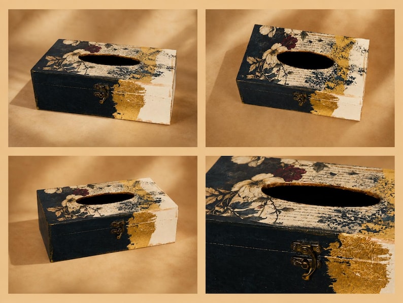 May include: A rectangular tissue box cover featuring a dark navy blue and white surface with a floral pattern, script text, and gold leaf accents. The box includes an oval opening on the top and a small, metallic bronze-coloured latch on the front.