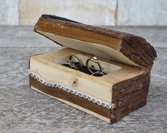 Unique rustic style cedar wood ring holder for wedding or engagement.