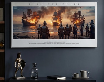 May include: A rectangular canvas print titled BURN THE SHIPS featuring a historical scene of soldiers on a beach watching three sailing ships burning at sunset. Below the image, text describes Hernán Cortés landing in Mexico in 1519.