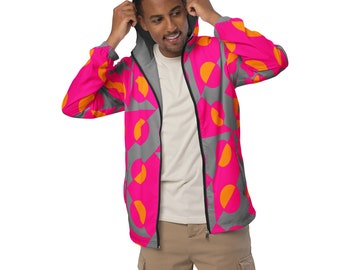 Può includere: Una giacca con cappuccio rosa e arancione con un motivo geometrico e chiusura a zip.