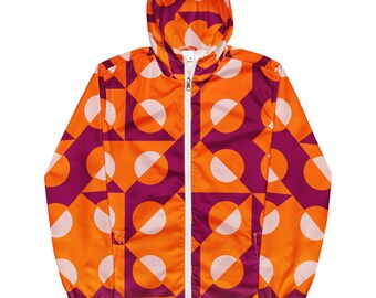 Può includere: Una giacca con cappuccio con un motivo geometrico in arancione, rosa e viola. La giacca ha una cerniera e un cappuccio.