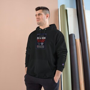 May include: A black hooded sweatshirt featuring a graphic print on the chest that mimics a computer error window. The text reads Error 404 Social skills not found, accompanied by a question mark face icon and a Wi-Fi symbol in white and red.