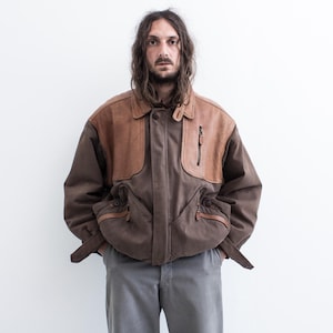 Blouson aviateur BOXY des années 80. Blouson en cuir et coton Chevignon . Blouson aviateur court pour corvée