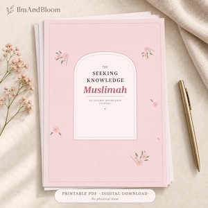 May include: A light pink journal with a white arched frame on the cover featuring the text The Seeking Knowledge Muslimah An Islamic Knowledge Journal. The cover has a subtle dotted pattern and small floral illustrations in pink and green.