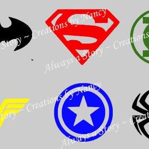 May include: Six superhero logos in black, red, green, yellow, blue, and black. The logos are for Batman, Superman, Green Lantern, Wonder Woman, Captain America, and Spider-Man.