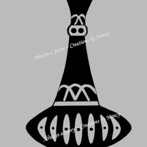 May include: Black and white silhouette of a genie bottle with decorative details. The bottle has a wide base and a narrow neck. The text "Always a Story - Creations by Nancy" appears twice on the bottle.