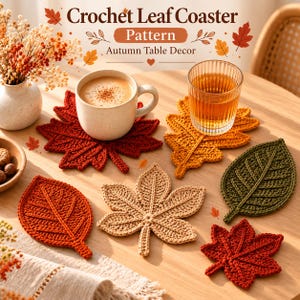 May include: A collection of crochet leaf coasters in red, orange, beige, and green, arranged on a wooden table with a coffee mug and a glass of tea. The text "Crochet Leaf Coaster Pattern Autumn Table Decor" is displayed at the top of the image.