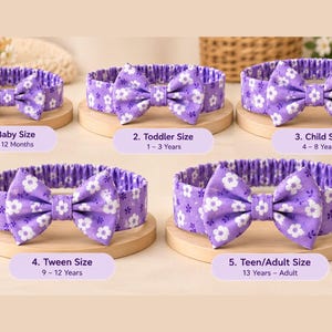 May include: Five purple fabric headbands with white floral patterns and attached bows, labeled by size: 1. Baby Size 0-12 Months, 2. Toddler Size 1-3 Years, 3. Child Size 4-8 Years, 4. Tween Size 9-12 Years, and 5. Teen/Adult Size 13 Years-Adult.