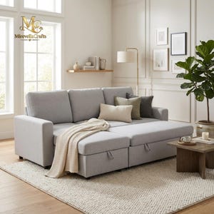 May include: A light gray sectional sofa bed with a pull-out sleeper section, featuring a textured cream-colored throw blanket draped over the seat, two square gray throw pillows, and one rectangular cream-colored throw pillow.