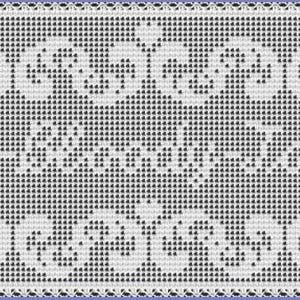 May include: A rectangular, white, crocheted doily with a repeating pattern of black dots and floral designs. The doily has a decorative border and a central text element. The overall design is symmetrical and intricate.