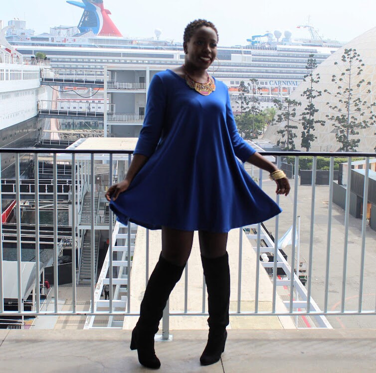Navy dress with tights scrolling and boots