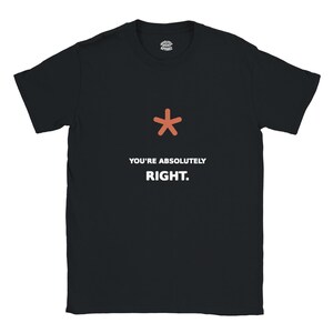Könnte beinhalten: Ein schwarzes Kurzarm-T-Shirt mit einem rostfarbenen Sternchen-Symbol, das über dem weißen Text YOU'RE ABSOLUTELY RIGHT zentriert ist. Das innere Nackenetikett zeigt den Text ABSOLUTELY RIGHT APPAREL in einem kreisförmigen Logo-Design.