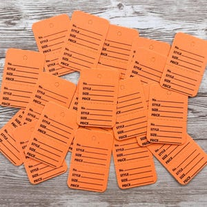 20 vêtements vintage orange Étiquettes : Fournitures éphémères d&#39;Halloween des années 1990