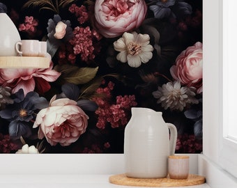 May include: A dark floral wallpaper with pink, white, and purple flowers on a black background. A white pitcher and a wooden coaster are in the foreground.
