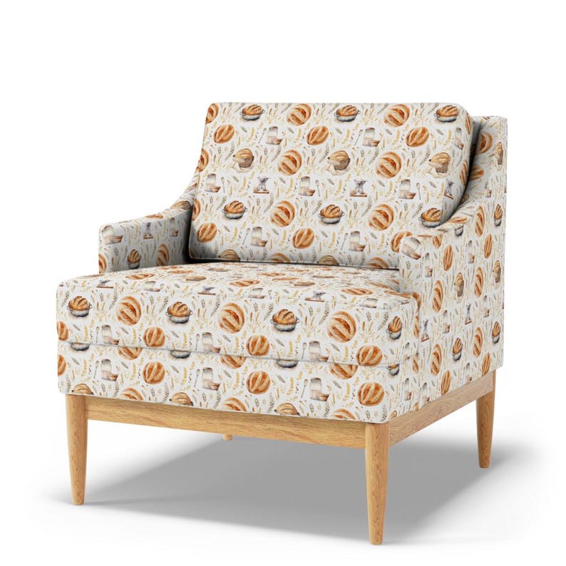 Chair upholstered in earthy French sourdough bread fabric with vintage beige loaf, wheat, and grain print, perfect for rustic farmhouse or countryside kitchen seating