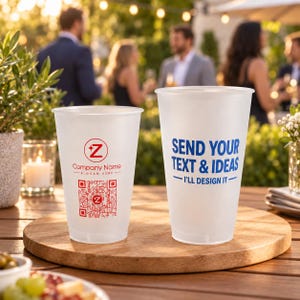May include: Two frosted plastic cups on a wooden board. The left cup features a red circular logo with a Z, the text Company Name, and a QR code. The right cup displays blue text that reads SEND YOUR TEXT & IDEAS I'LL DESIGN IT.