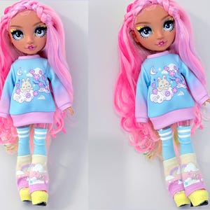 Outfit set for Rainbow High Dolls featuring rainbows and bunny graphics