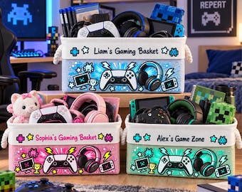 May include: Three rectangular fabric storage baskets with rope handles, each featuring a personalised name and gaming-themed graphics including controllers, headsets, and pixelated icons. The baskets are light blue, pink, and light green.