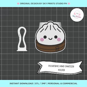May include: A white and brown dumpling-shaped PocketBac hand sanitizer holder with a smiling face and pink cheeks, accompanied by a separate white clip attachment. The text reads POCKETBAC HAND SANITIZER HOLDER and ORIGINAL DESIGN BY SKY PRINTS STUDIO PH.