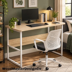 May include: A rectangular desk with a light wood grain surface and a white metal frame, featuring a lower shelf. An ergonomic office chair with a white lattice back and black seat cushion is positioned in front of the desk. The text WoodMasterDesignCo is visible at the bottom.