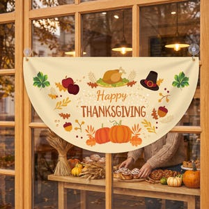 May include: A semi-circular cream-colored banner featuring the text Happy THANKSGIVING in brown letters. The design includes illustrations of a roasted turkey, a pilgrim hat, red apples, acorns, orange pumpkins, and green leaves on a light background.