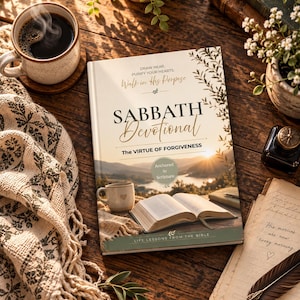 Op de afbeelding: Een hardcover boek getiteld Sabbath Devotional: The Virtue of Forgiveness. De kaft toont een zonsonderganglandschap, een open boek en een mok. De tekst bevat: Draw Near, Purify Your Hearts, Walk in His Purpose, Anchored in Scripture, Life Lessons From the Bible.