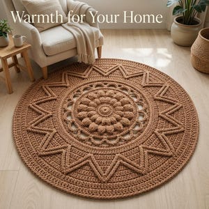 May include: A round, brown crochet rug featuring a central floral-inspired pattern surrounded by a geometric starburst border. The text "Warmth for Your Home" is visible in the upper portion of the image above the rug.