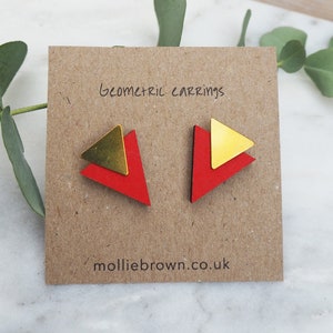 May include: Geometric earrings with red and gold triangles. The earrings are on a brown card with the text "Geometric Earrings" and "molliebrown.co.uk".