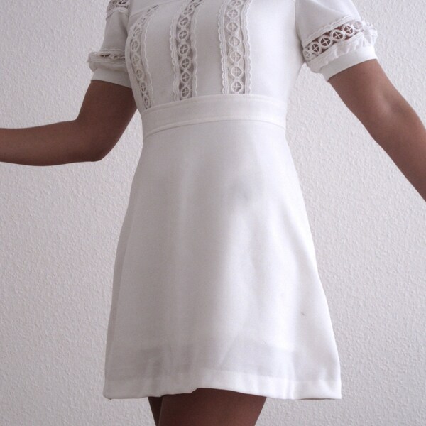 On trend white vintage 1960s lace detail dress