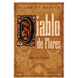 May include: A rectangular product label with a tan, distressed background. The text reads HECHO EN MEXICO, Diablo de Flores, 100% DE AGAVE, and 750 ML. The letter D is stylised as a black frame containing an illustration of a horned figure.