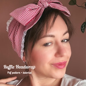 May include: A red and white gingham headwrap featuring a large bow on top and white eyelet lace trim along the edges. The text Ruffle Headwrap Pdf pattern + tutorial is printed in white on the lower left side of the image.
