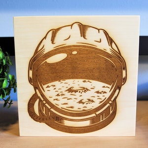 Space Helmet - laser engraved wood shelf sign available in 2 sizes.