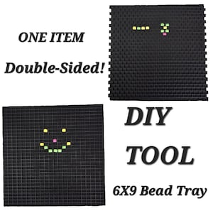 May include: A double-sided black 6x9 bead tray with a grid pattern. The tray features small yellow and pink beads arranged in patterns on the surface. Text on the image reads: ONE ITEM Double-Sided! DIY TOOL 6X9 Bead Tray.