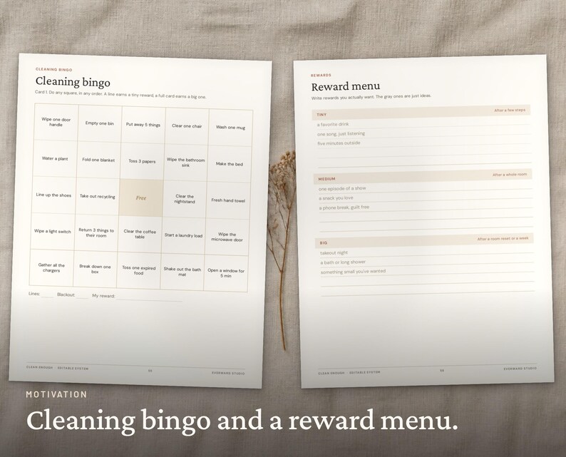 May include: Two white paper sheets featuring black text and grid layouts. The left sheet is titled Cleaning bingo with a five-by-five grid of tasks. The right sheet is titled Reward menu with sections for tiny, medium, and big rewards.
