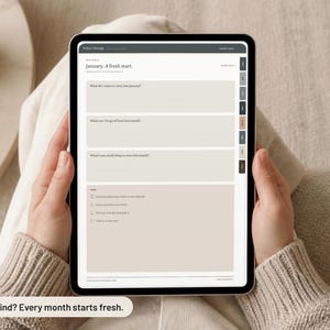 May include: A digital tablet displaying a monthly planner interface with the text January. A fresh start. The screen features structured input fields for monthly goals and reflection, with a sidebar navigation menu containing colored tabs.