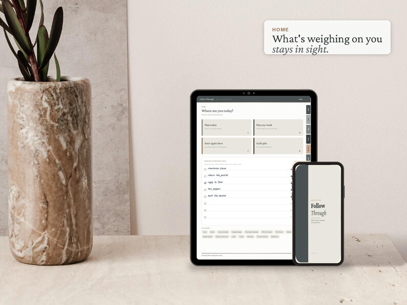 May include: A digital planner displayed on a tablet and smartphone screen, featuring a task list interface with the text "Follow Through" and "What's weighing on you stays in sight." The devices are positioned next to a tall, cylindrical marble vase.