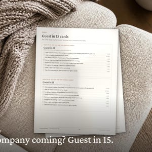 May include: A white paper sheet featuring two identical checklists titled Guest in 15 cards. Each list includes tasks like grab a laundry basket, hide the basket, put dishes in the sink, gather trash, wipe the sink, straighten seating, and clear a spot.
