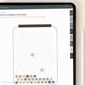 May include: A digital tablet screen displaying a task tracker page titled One less thing on my mind. The page features a large jar outline filled with small circles for tracking tasks, with some circles colored in shades of brown and gray.