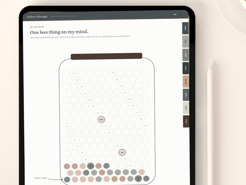 May include: A digital tablet screen displaying a task tracker page titled One less thing on my mind. The page features a large jar outline filled with small circles for tracking tasks, with some circles colored in shades of brown and gray.