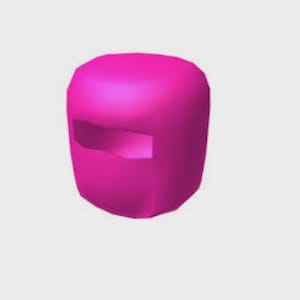 Op de afbeelding: Een felroze, afgerond, blokvormig object met een glad, effen oppervlak. Het is voorzien van een enkele, horizontale, rechthoekige uitsparing aan de bovenzijde van de voorzijde, wat een duidelijke, holle opening creëert.