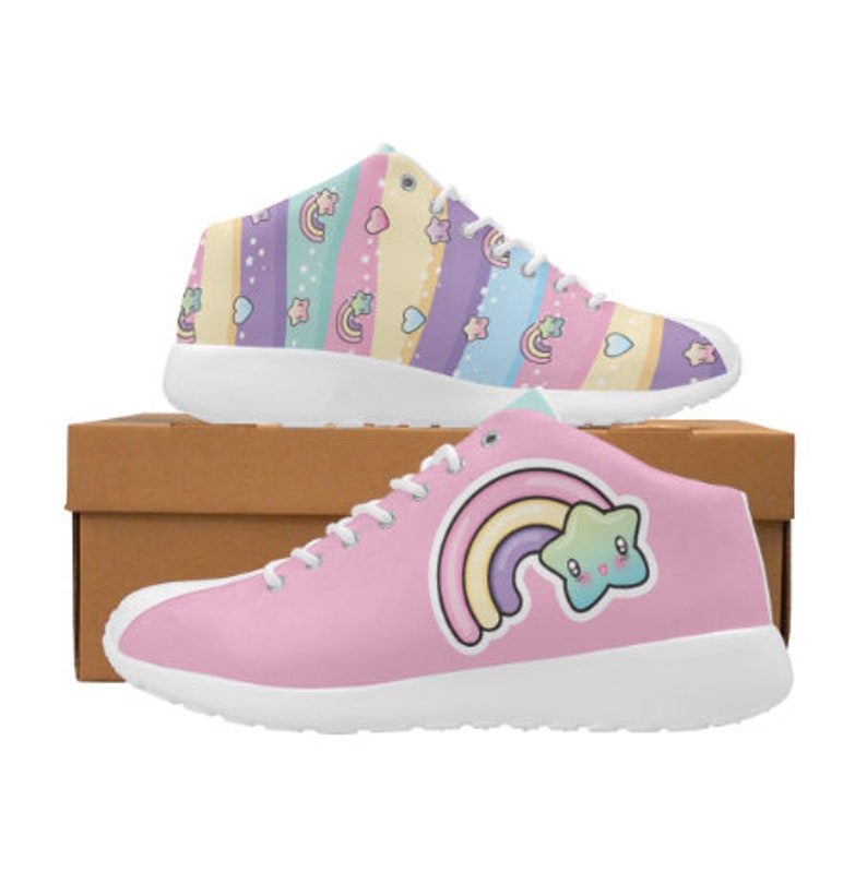 Basket Ball style Sneakers with a Pastel wavy Rainbow all over print on the inside upper then a Large Rainbow and Star Graphic on the Outer side with solid Pastel Pink background. Made from faux Suede.