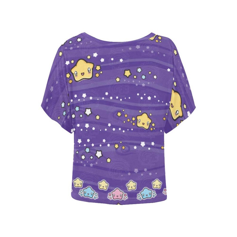 May include: Purple short-sleeved shirt with a print of yellow stars with smiling faces on a purple background with white stars. The bottom of the shirt has a row of colorful stars.